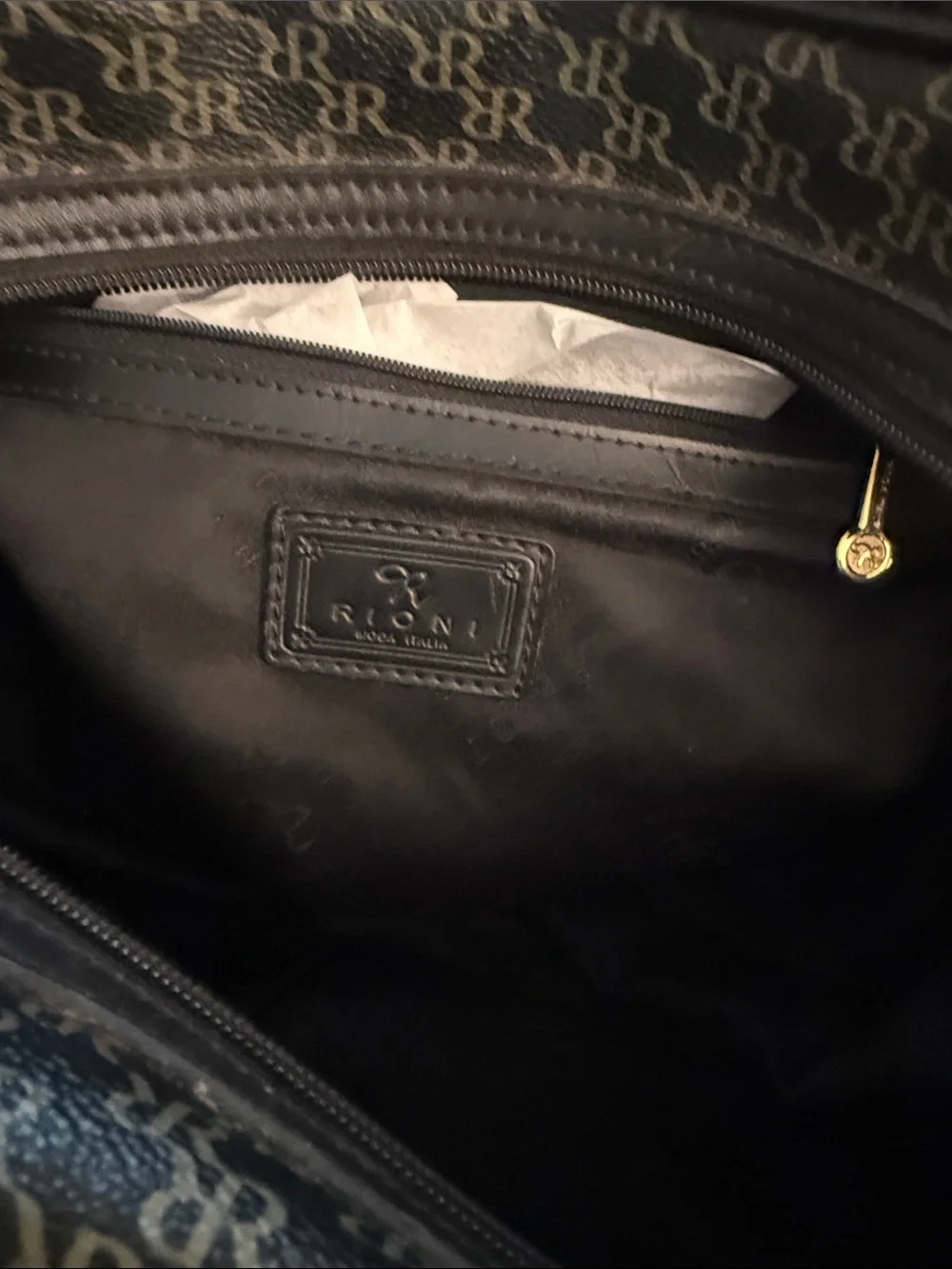 Rioni Signature Organizer Satchel featuring a black monogram 